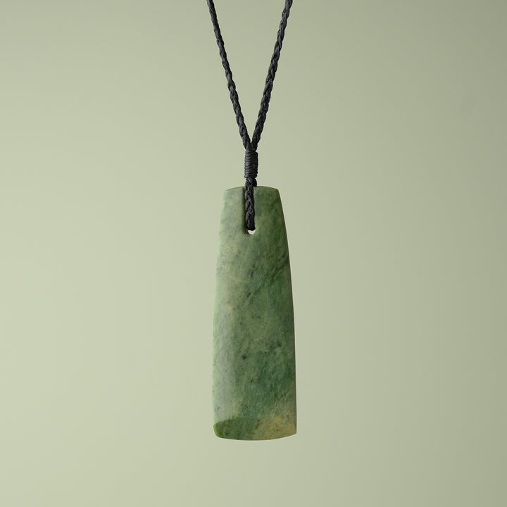 Large Raukaraka Pounamu Toki, Black Binding