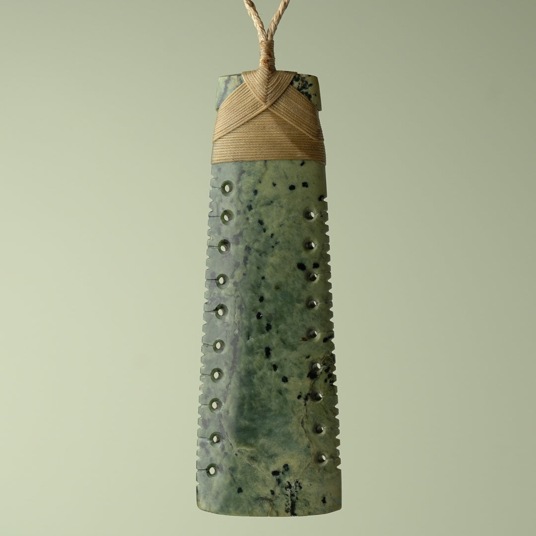 Toki Inanga Pounamu on Wood Base