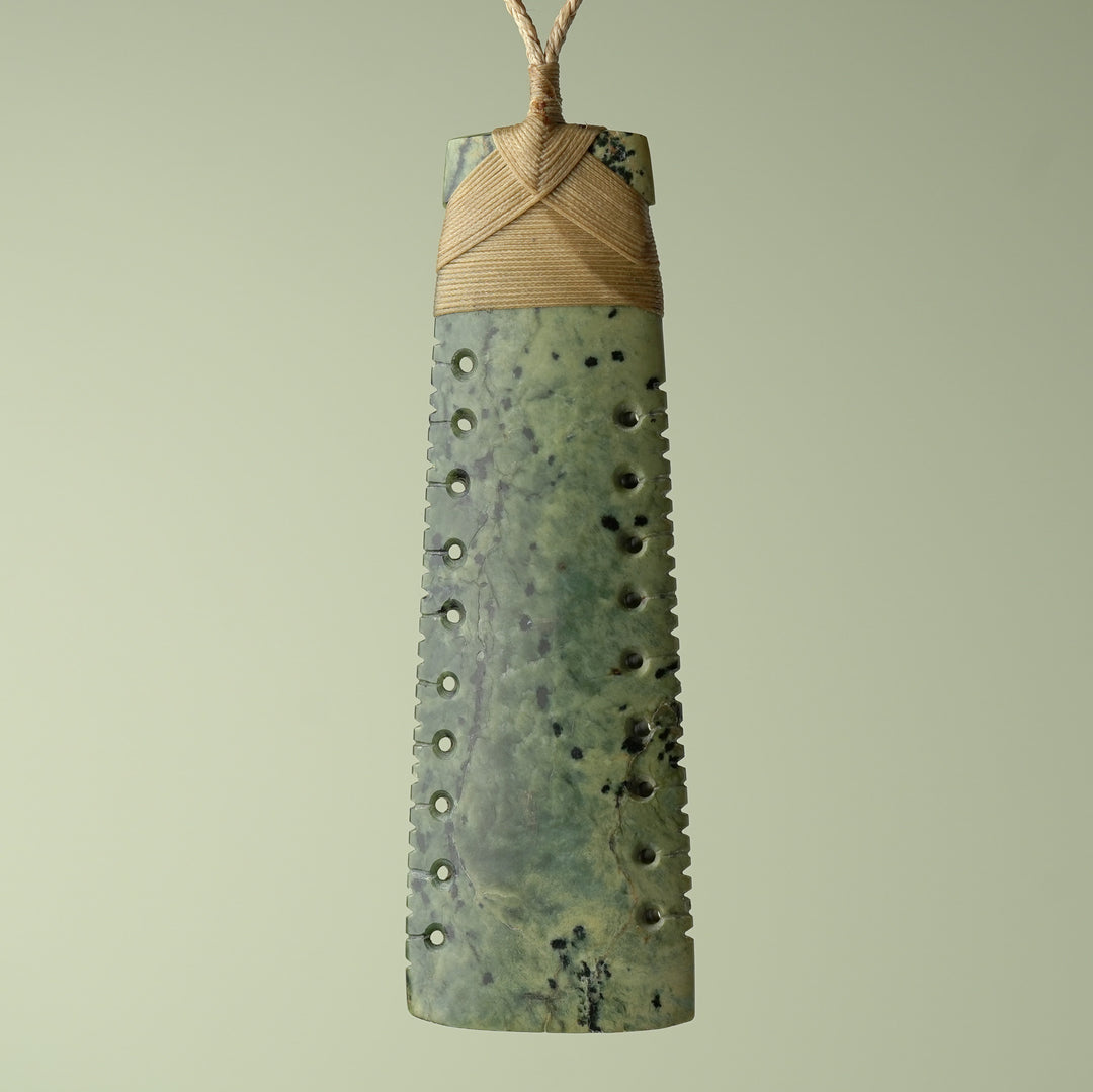 Toki Inanga Pounamu on Wood Base