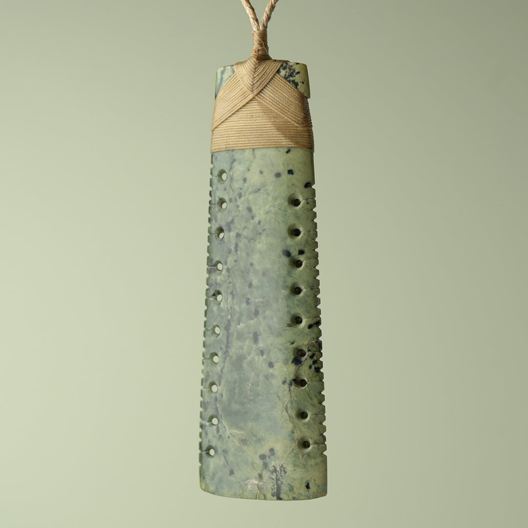 Toki Inanga Pounamu on Wood Base