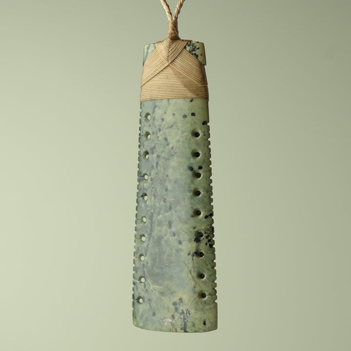 Toki Inanga Pounamu on Wood Base