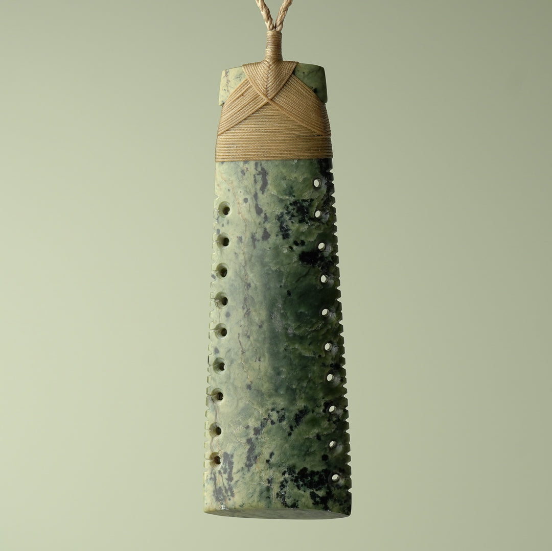 Toki Inanga Pounamu on Wood Base