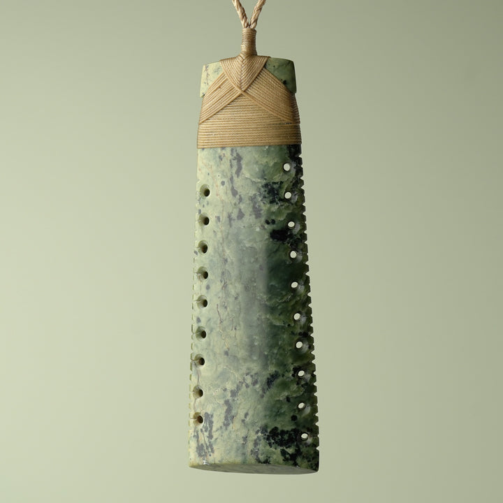 Toki Inanga Pounamu on Wood Base