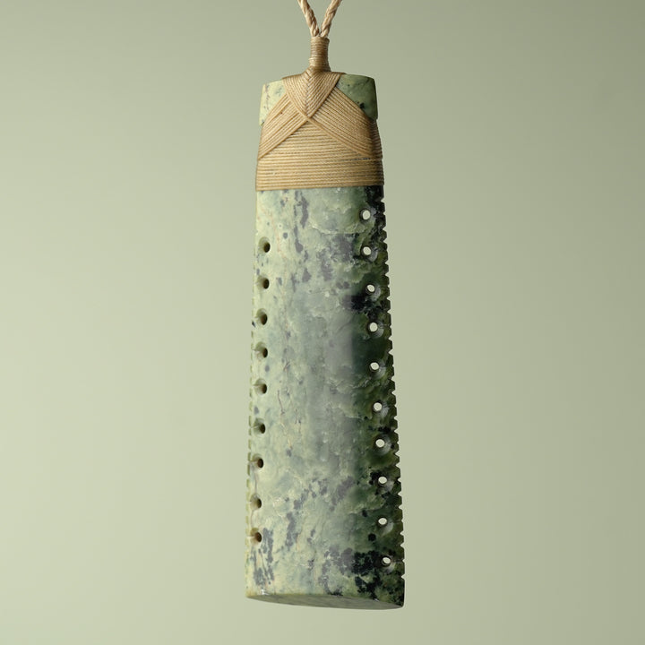 Toki Inanga Pounamu on Wood Base