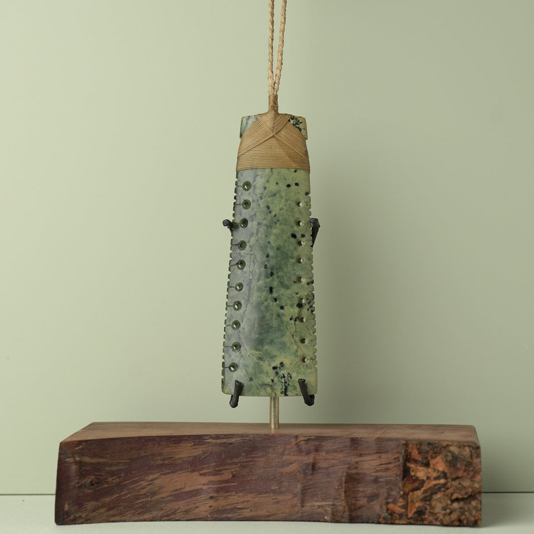 Toki Inanga Pounamu on Wood Base