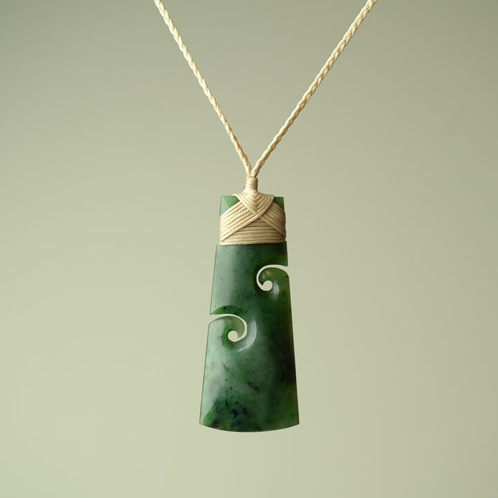 Large Pounamu Toki with Koru, Tan Binding