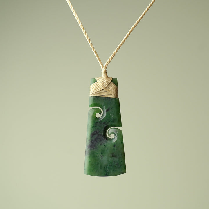 Large Pounamu Toki with Koru, Tan Binding