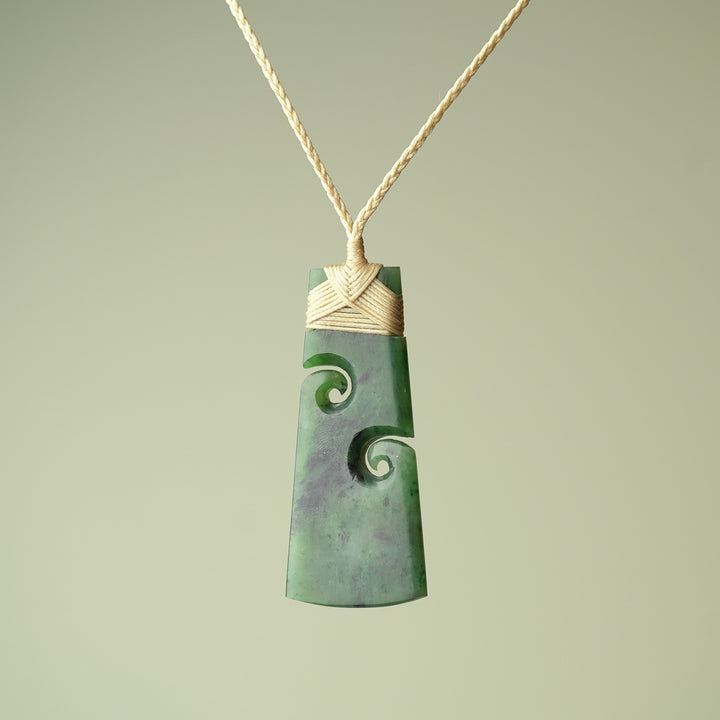 Large Pounamu Toki with Koru, Tan Binding