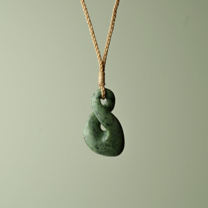 Small Kokopu Pounamu Pikorua, Tan Binding