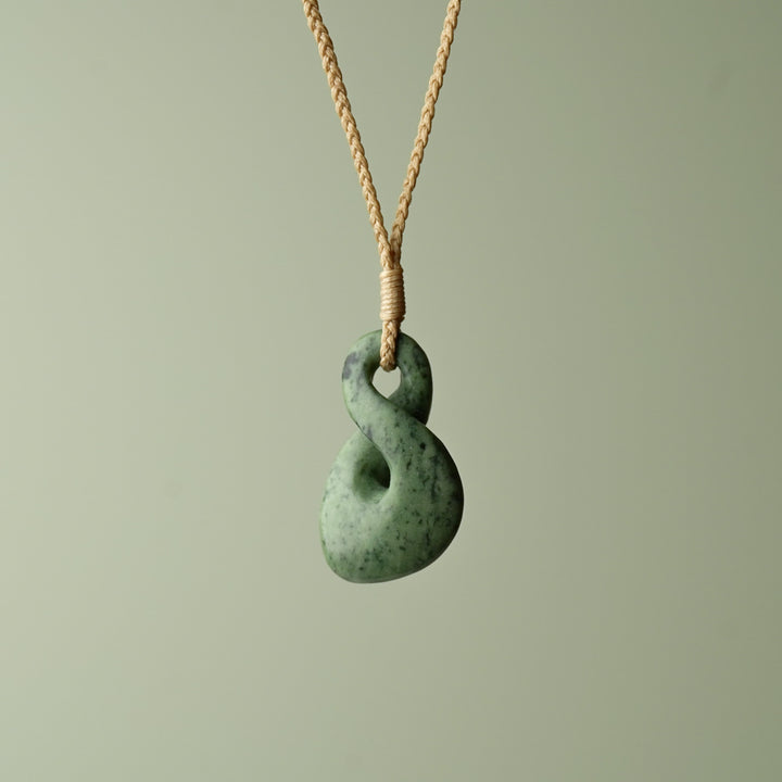 Small Kokopu Pounamu Pikorua, Tan Binding